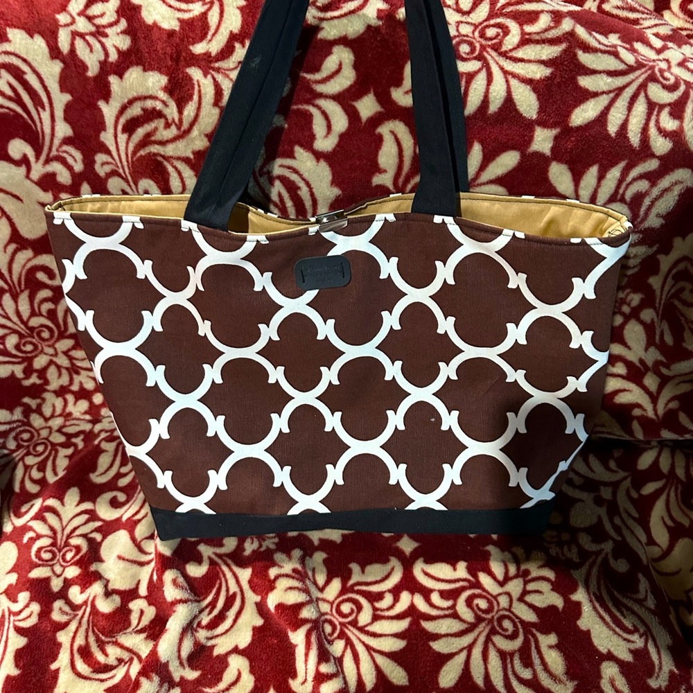 Handmade tote. 17x10x5 lined with zipper pocket inside.